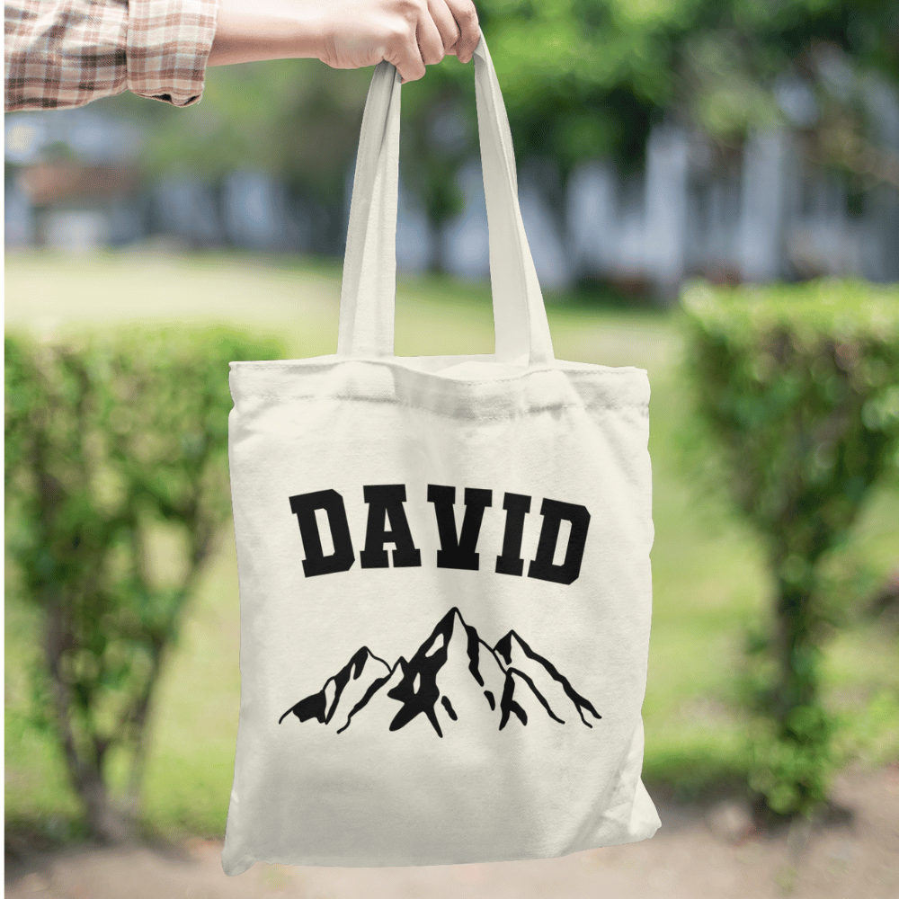 Personalise this mountain tote with any name! A rugged, eco-friendly cotton bag perfect for hikers, campers, or outdoor-loving gift seekers.