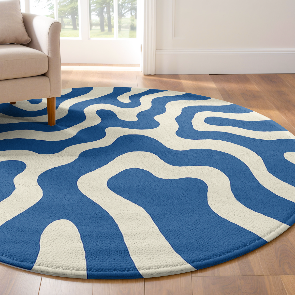 Blue and white circular rug featuring a wavy line design, styled in a cozy, well-lit space.