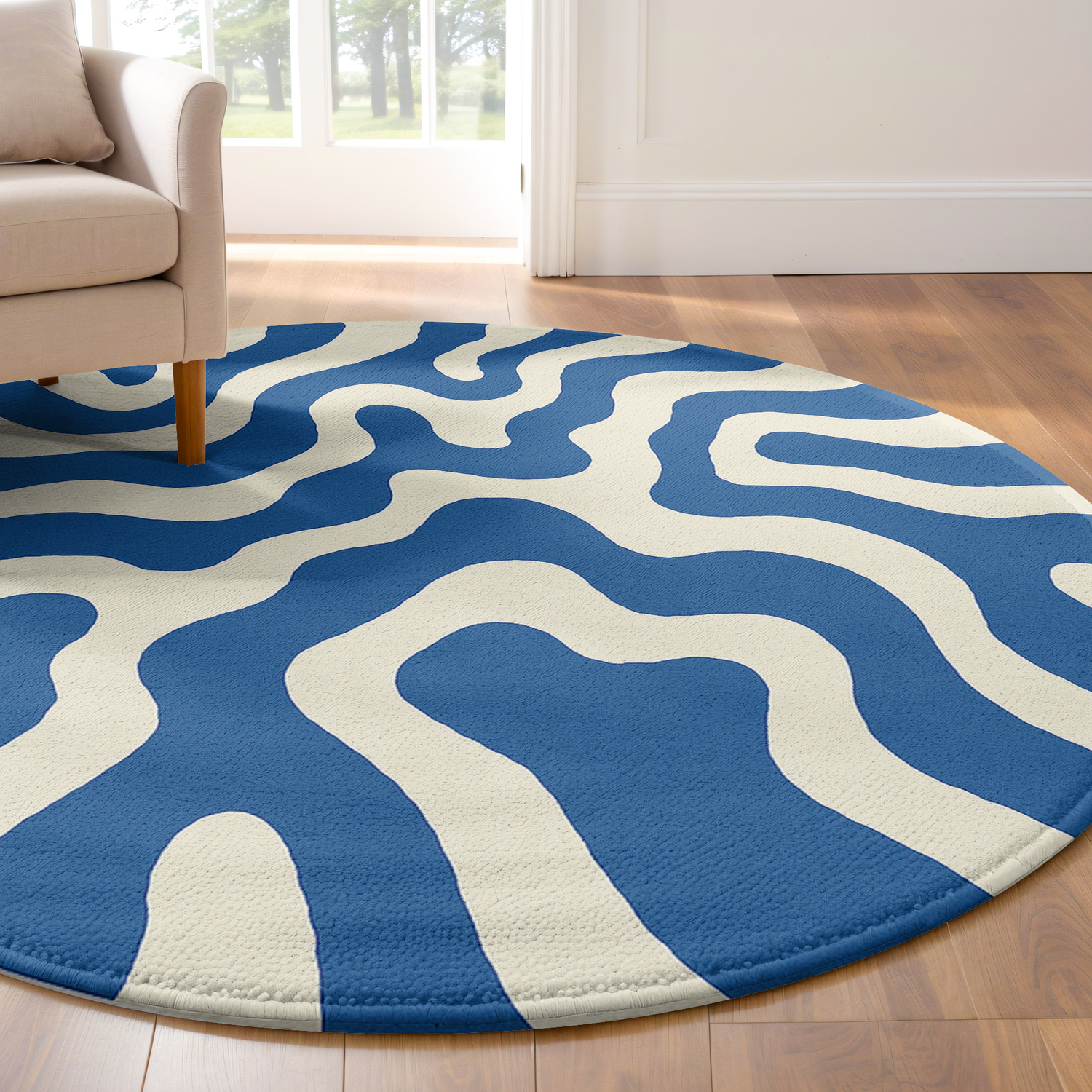 Blue and white circular rug featuring a wavy line design, styled in a cozy, well-lit space.