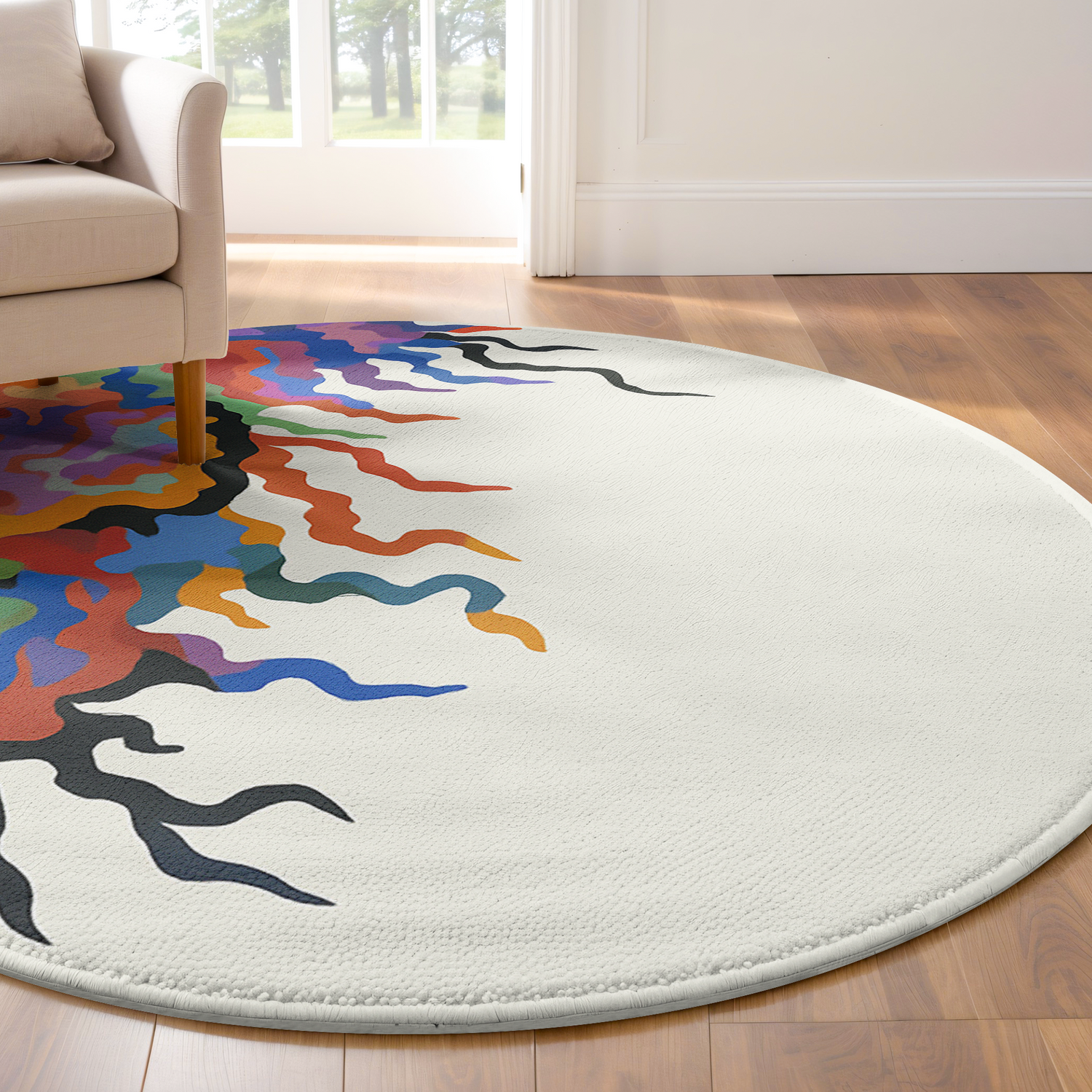 Round rug with flowing abstract multicolor design in red, purple, orange, teal, and black on a clean off-white background in a modern room.