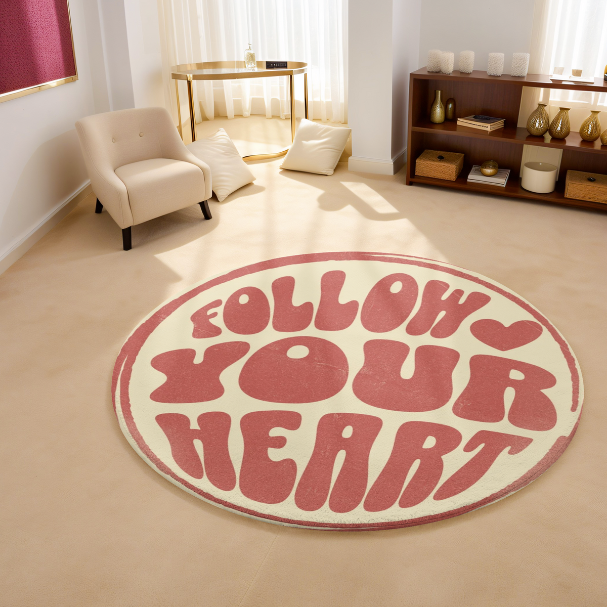 Round rug with retro pink text reading “Follow Your Heart” on a cream background, styled in a bright, modern room with playful decor.
