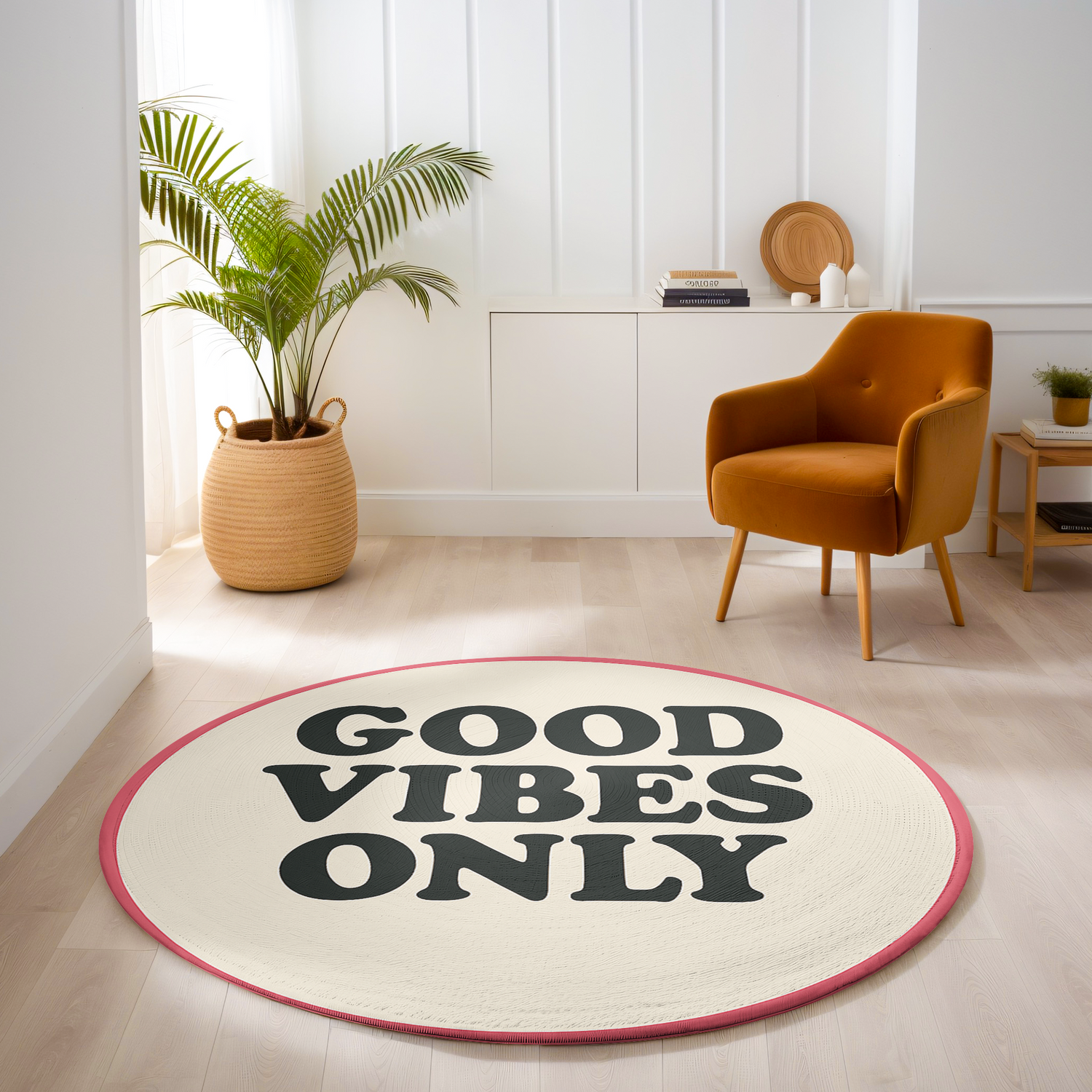 Round cream rug with bold black text reading “Good Vibes Only” and a pink border, designed in a playful retro style.