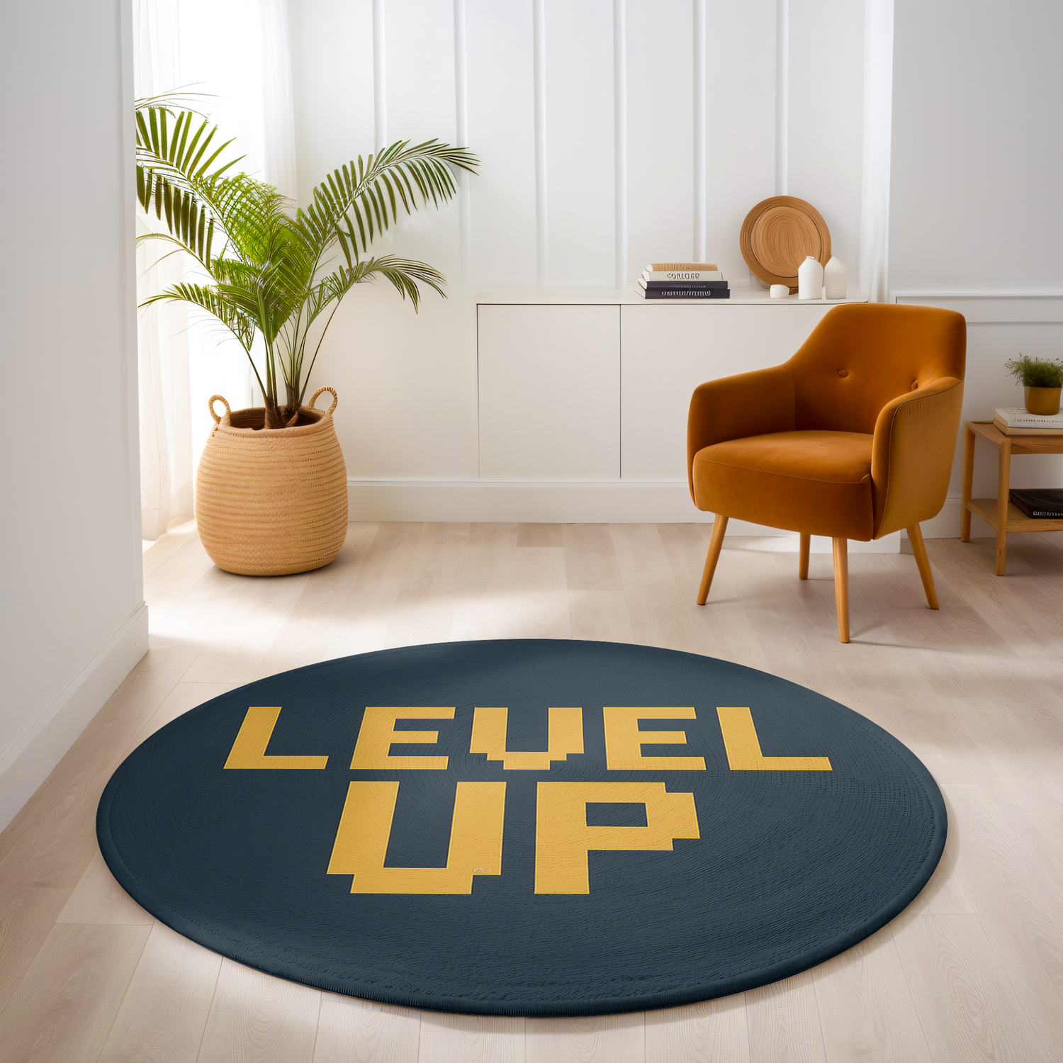 Round rug with yellow pixel-style “LEVEL UP” text on a dark charcoal background, in a clean modern space with bold, minimalist styling.