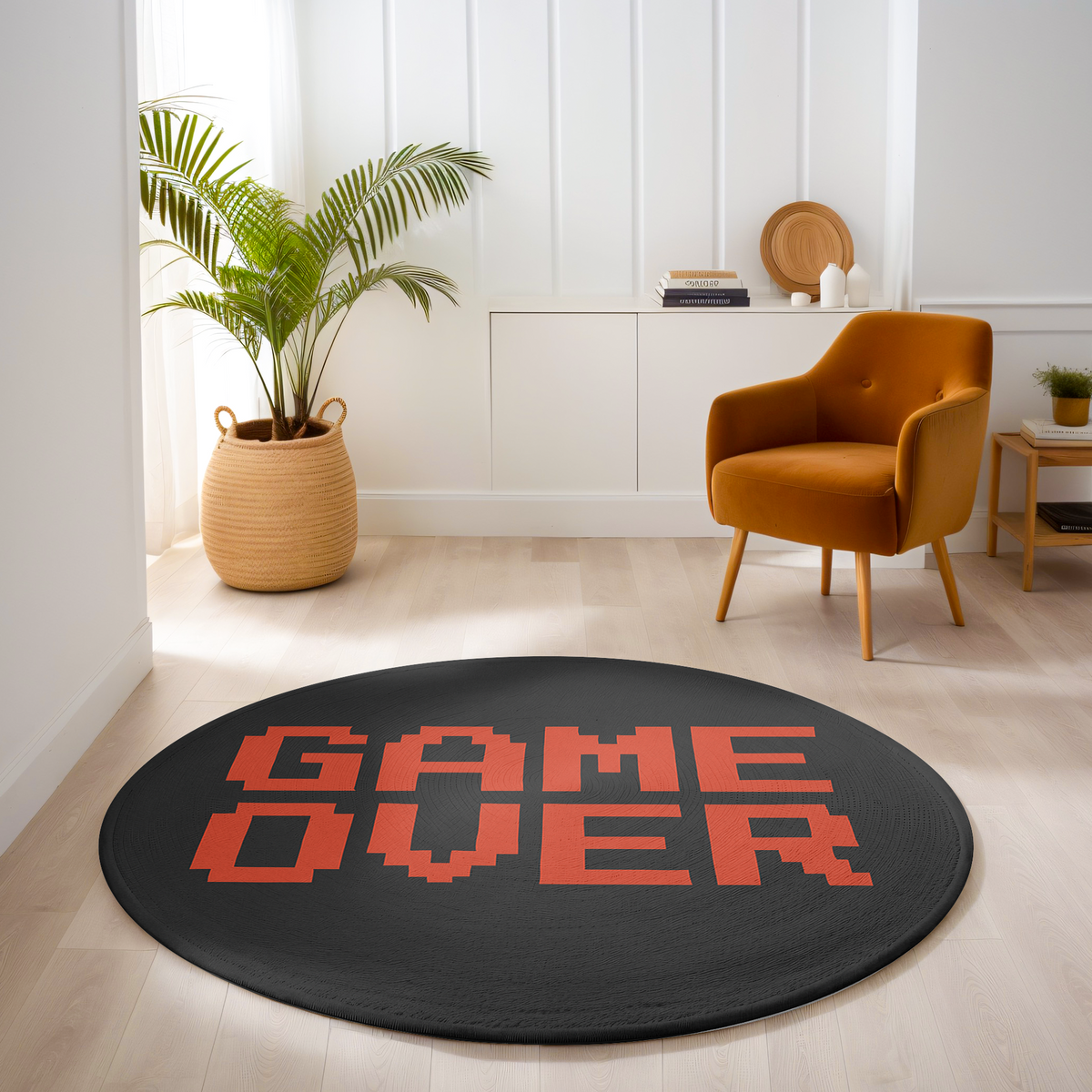 Round black rug with red pixel-style “GAME OVER” text, placed in a bright modern room with minimalist furnishings and warm neutral tones.