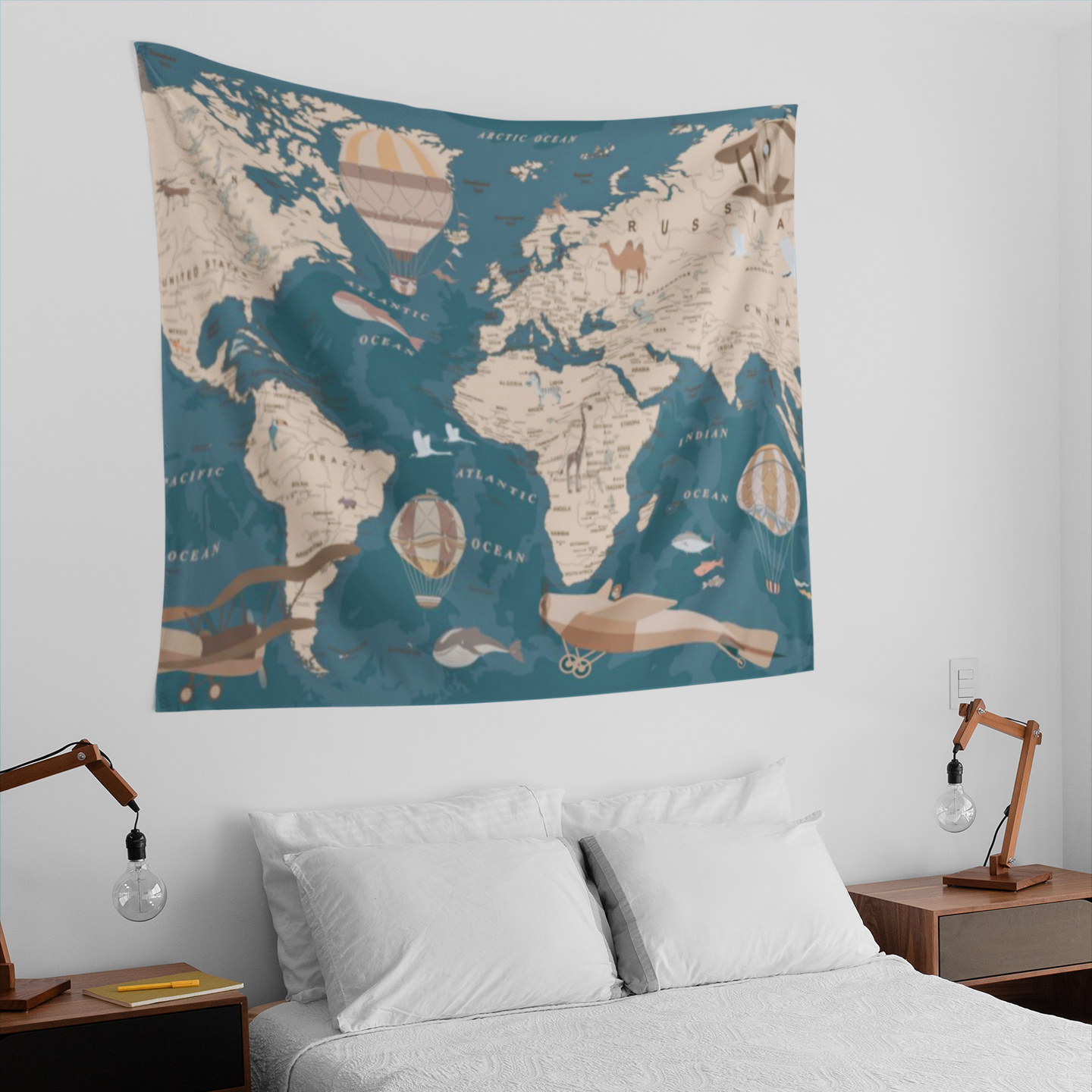Tapestry depicting a stylized world map with beige continents over a teal ocean background, decorated with illustrated hot air balloons, planes, animals, and ships in a soft vintage color palette.